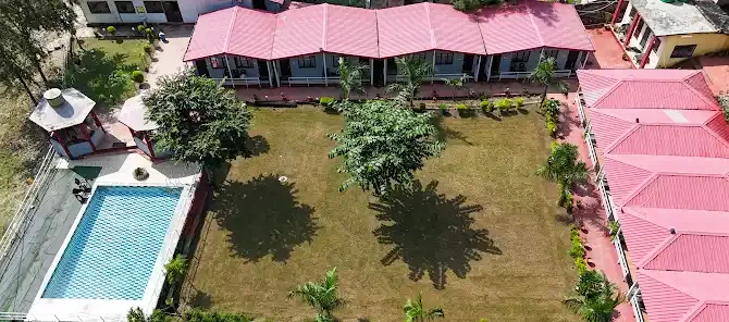 An overhead view of the pool and central lawn