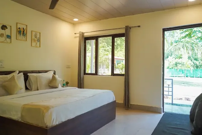A light-filled guest room opening to the outdoors