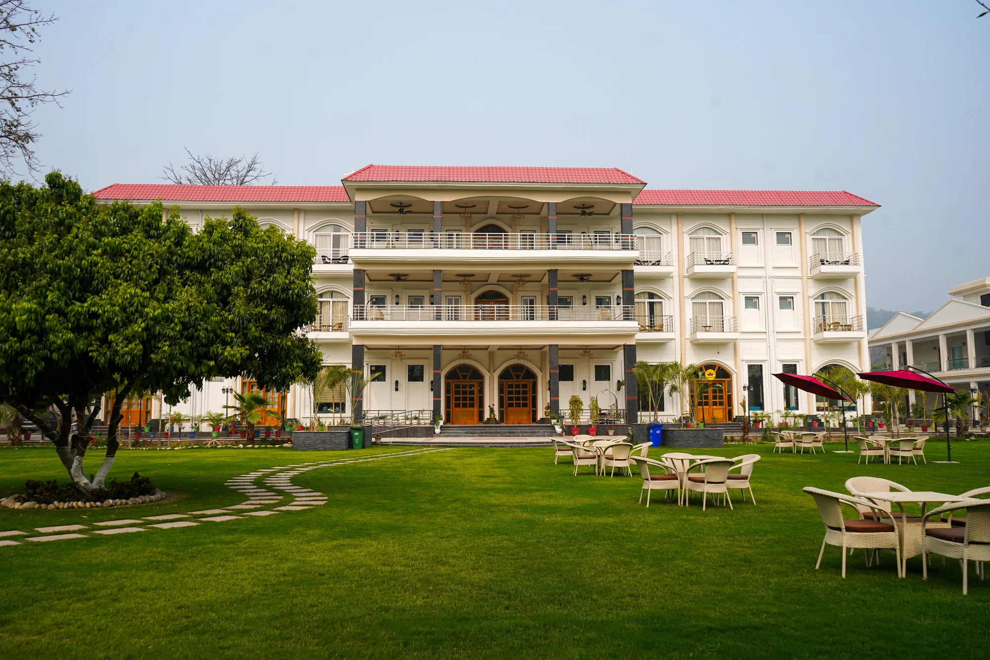 The resort facade and broad green lawn