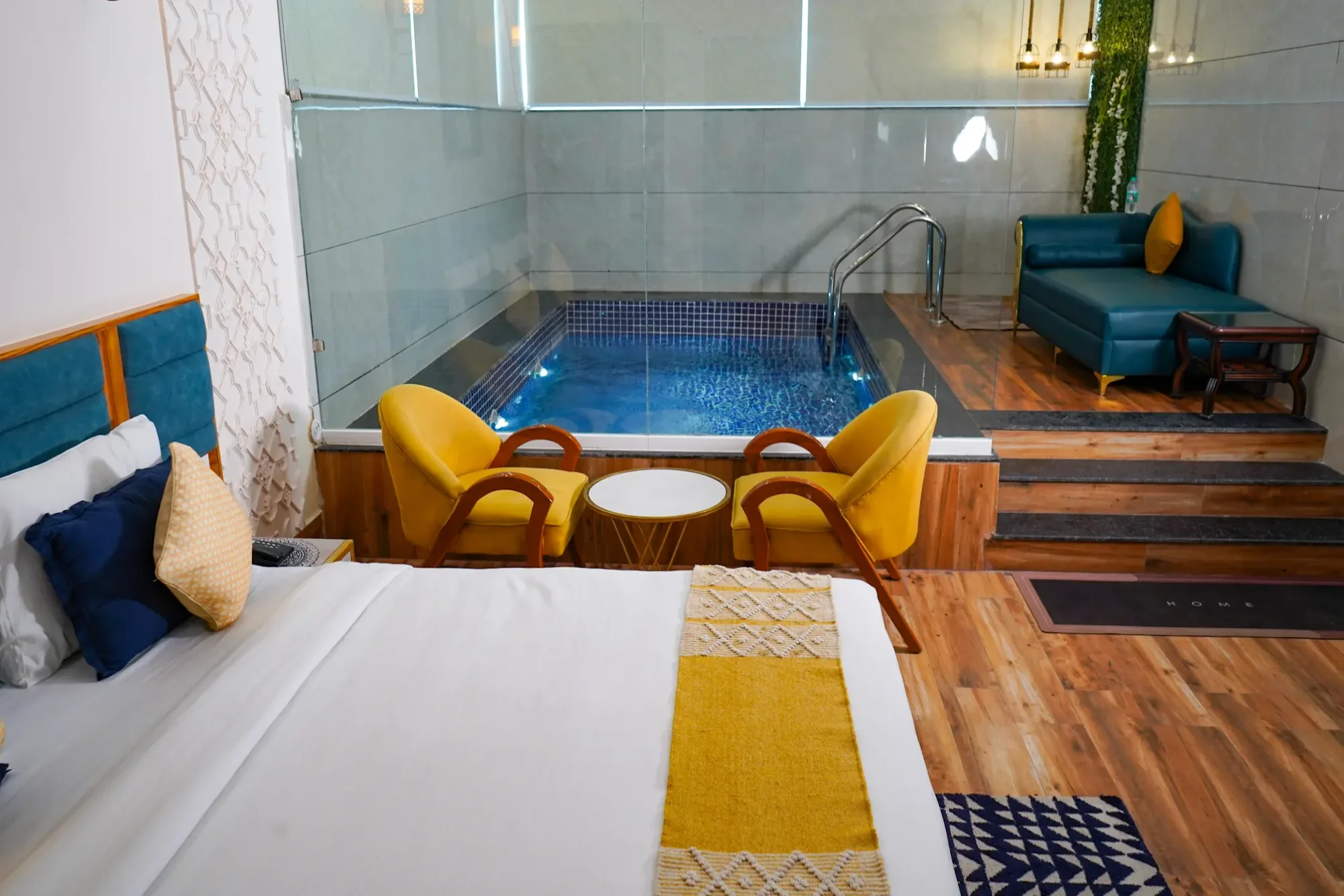 Guest room opening onto a private indoor plunge pool