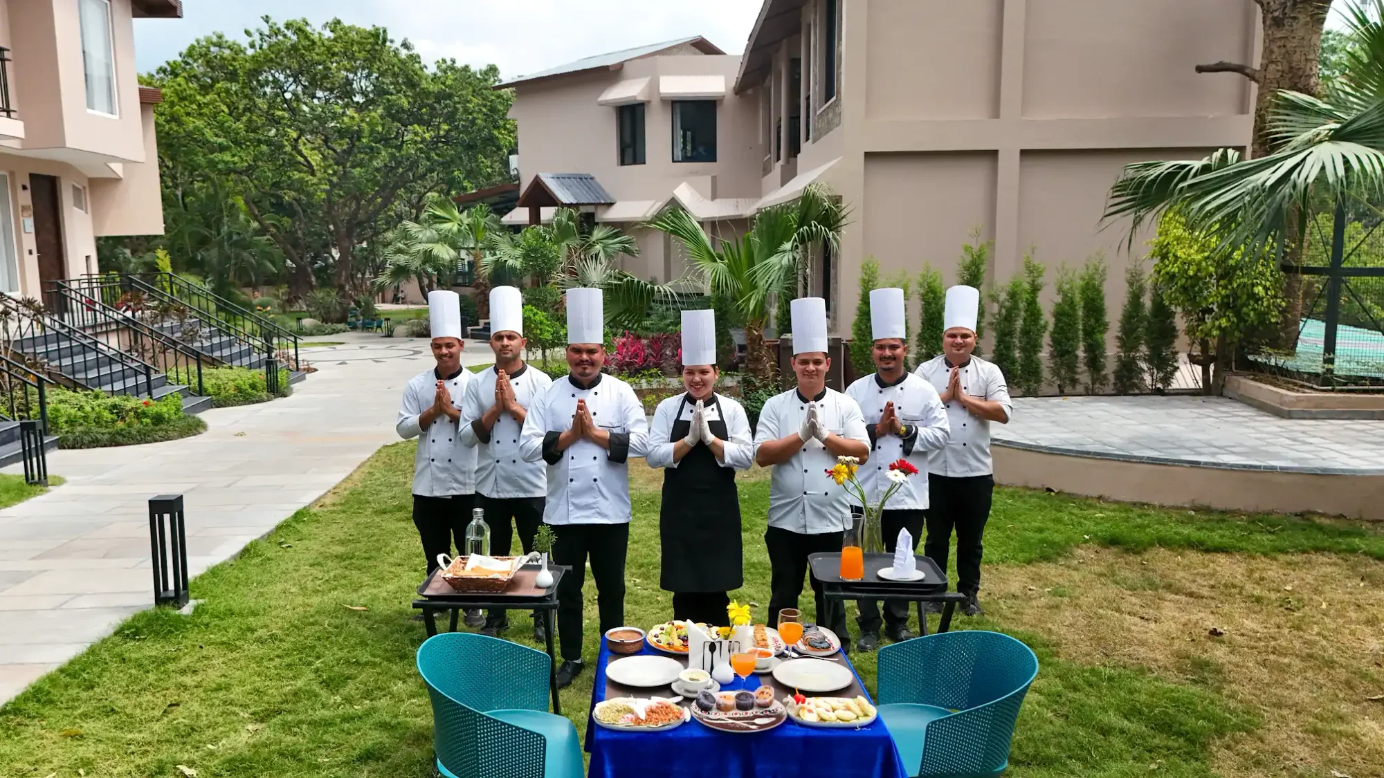 The culinary team gathered in the garden